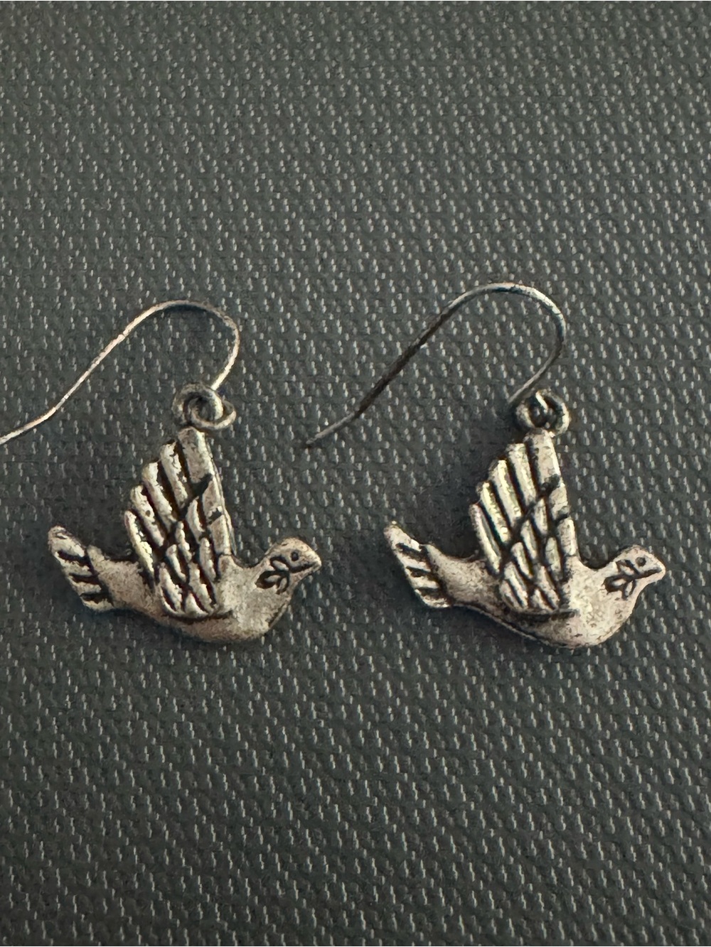 Silver -tone peace dove dangle earrings not stamped. Untested.